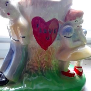 Vintage 1930's ceramic planter.  Boy & girl leaning against tree stump.